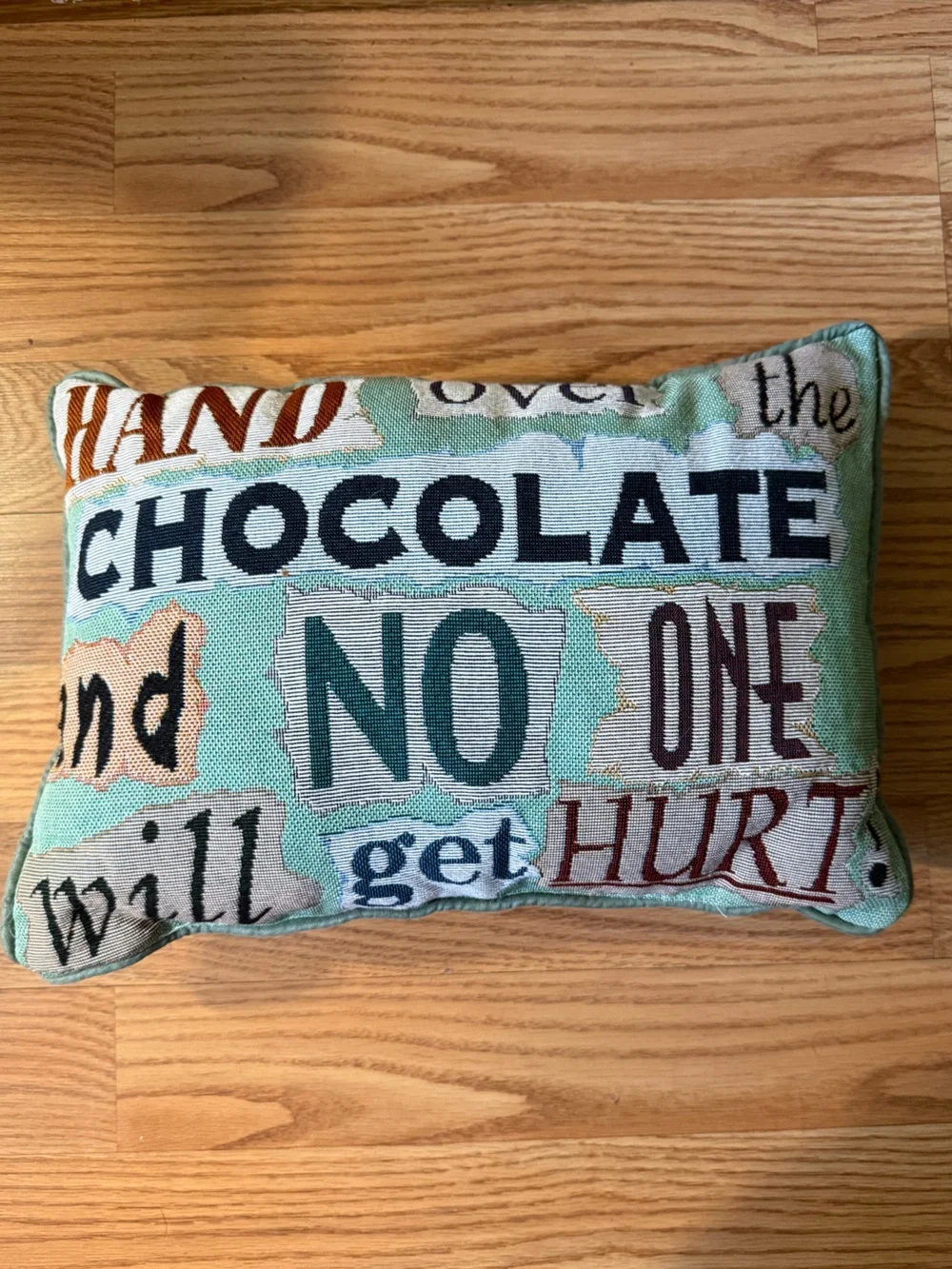 Tapestry decor pillow with phrase: HAND over the CHOCOLATE and NO ONE gets hurt